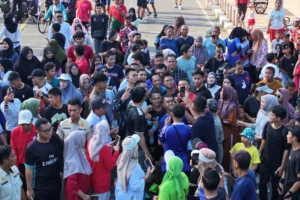 Ribuan Warga Antusias Ikuti Uji Coba Car Free Day di Jembatan Ampera