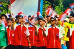 PEMUDA MUSLIMIN INDONESIA IKUTI DEFILE HUT BHAYANGKARA KE-80 SEBAGAI WUJUD DUKUNGAN TERHADAP TNI DAN POLRI