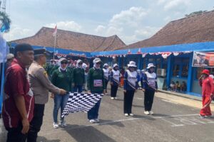 Gerak Jalan Ketepatan Waktu Meriahkan HUT ke-81 RI di Kayuagung